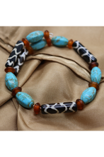 Cargar imagen en el visor de la galería, African tribal beads with turquoise howlite  bracelet
